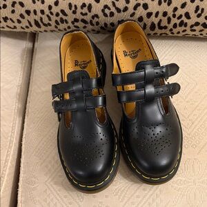 Dr. Martens Black Leather Flats with Yellow Stitching